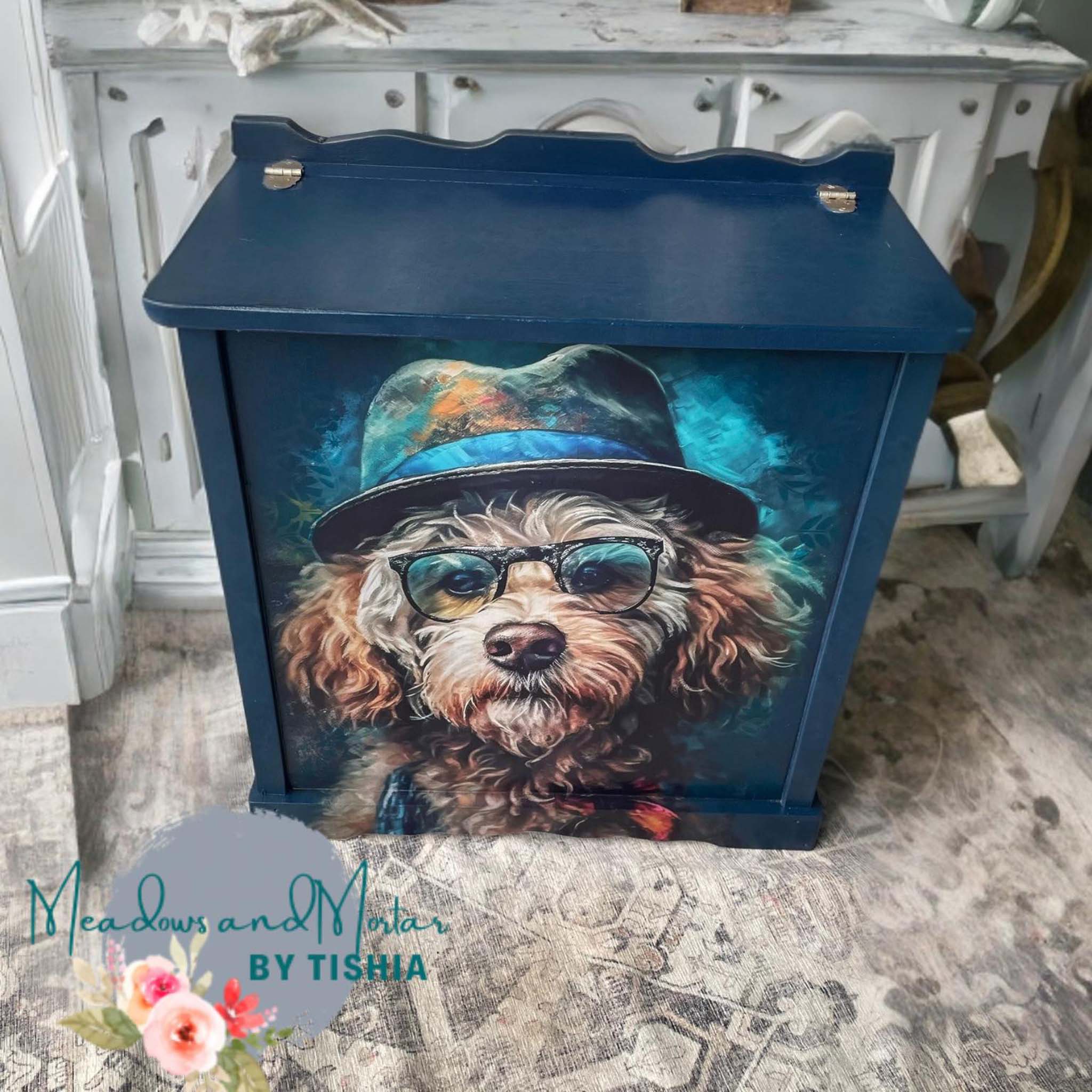 A vintage wood storage box refurbished by Meadows and Mortar by Tishia is painted blue and features Whimsykel's Doodle Bug tissue paper on it.