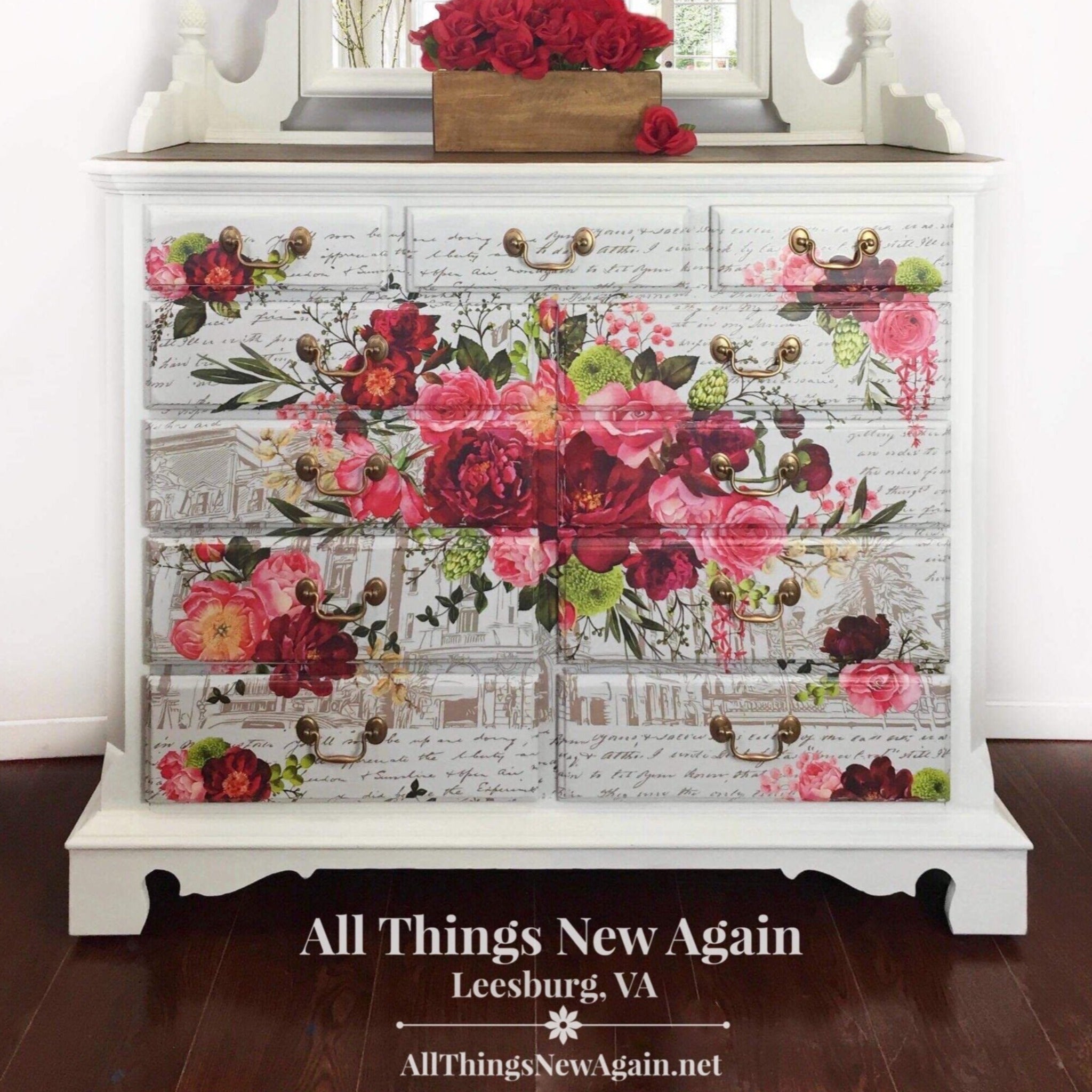 A vintage large dresser refurbished by All Things New Again is painted white and features ReDesign with Prima's Royal Burgundy transfer on the front of it.