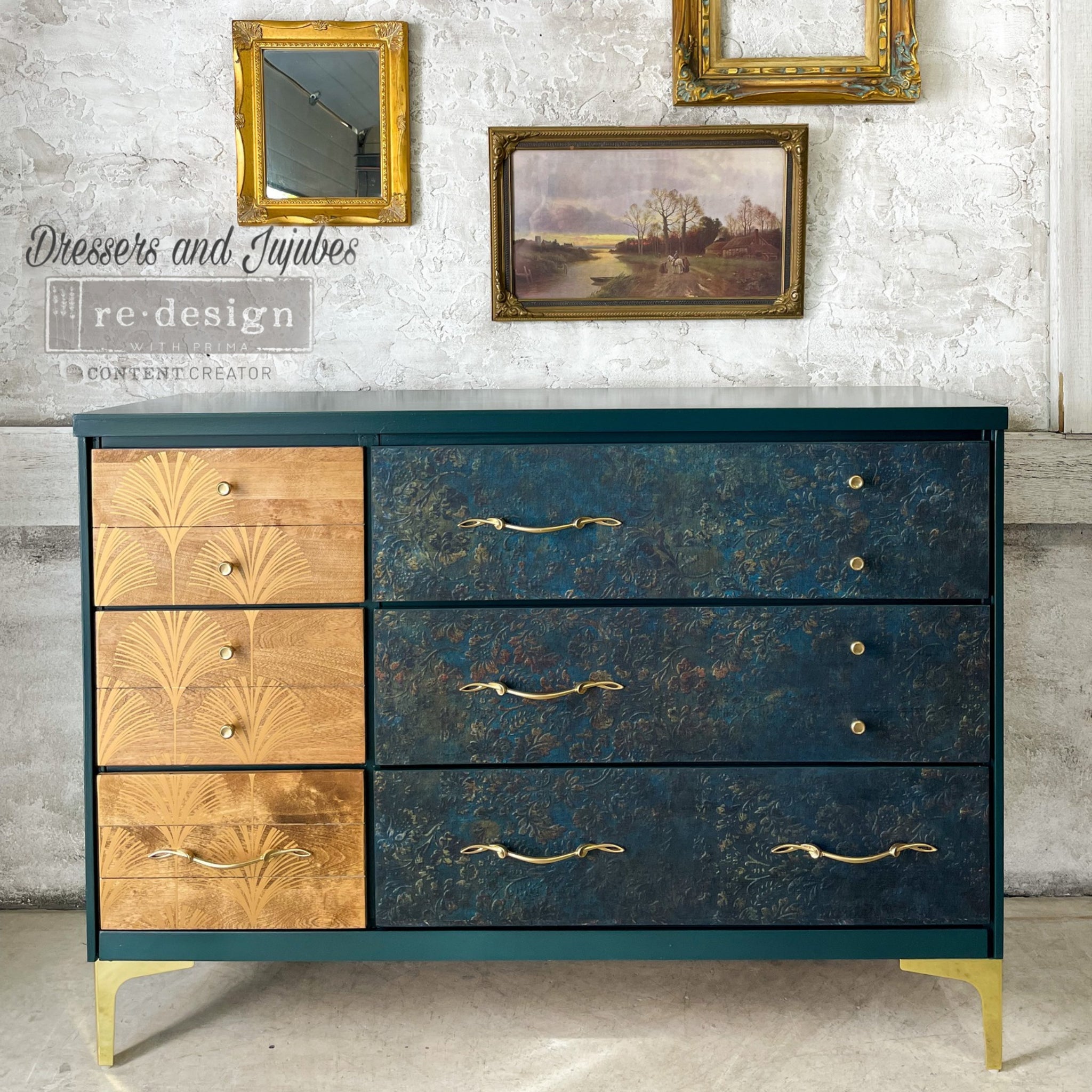 A mid century style dresser refurbished by Dressers and Jujubes is painted dark teal with gold legs and features ReDesign with Prima's Aged Patina A1 fiber paper on its 3 right large drawers. Three small left side drawers are stained a natural wood color and features a faint fan stencil design on them.