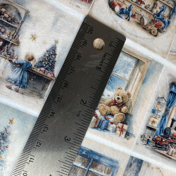 Ruler on a decorative paper with Christmas-themed illustrations