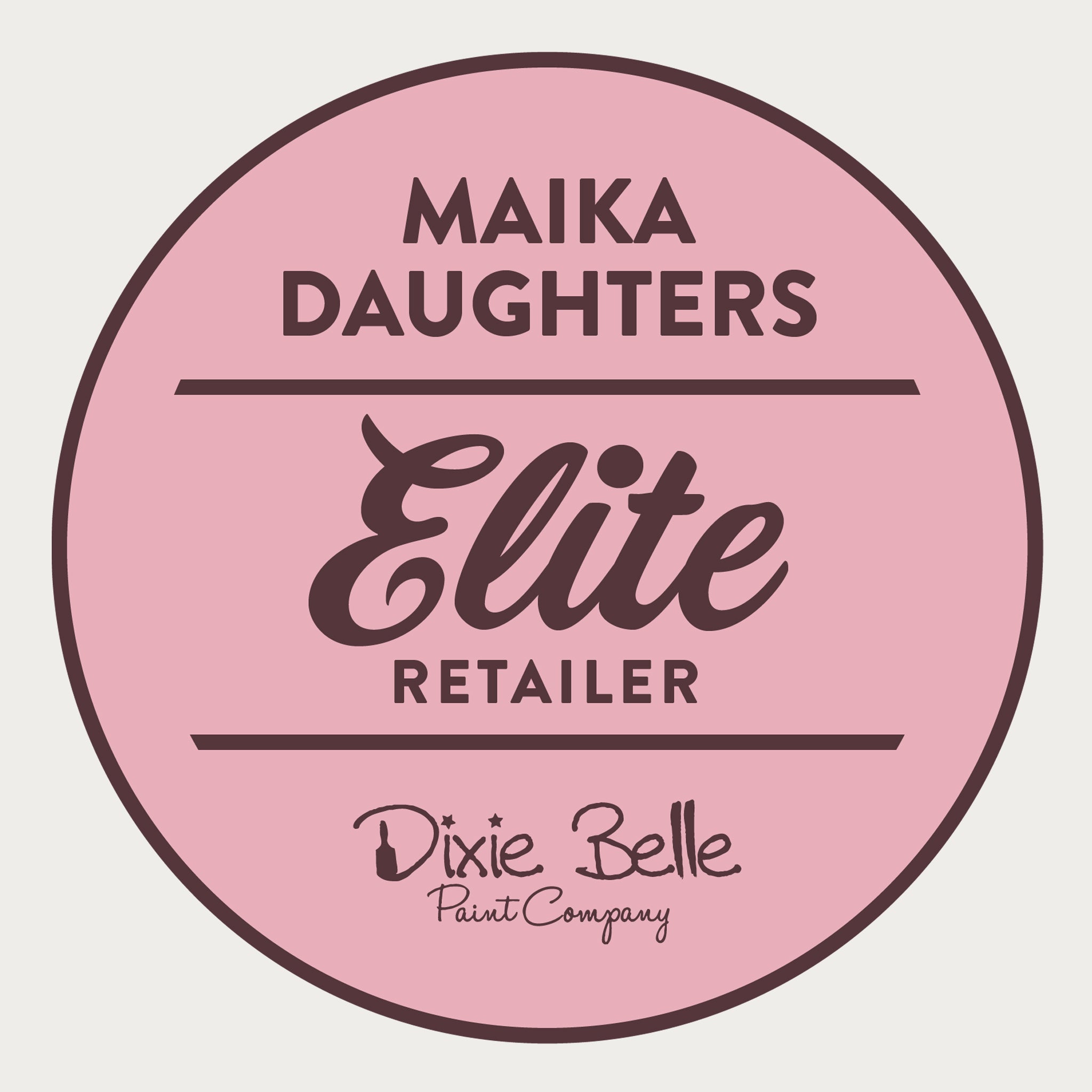 A white background with a pink circle with a brown outline and brown text reading: Maika Daughters. Elite Retailer. Dixie Belle Paint Company.