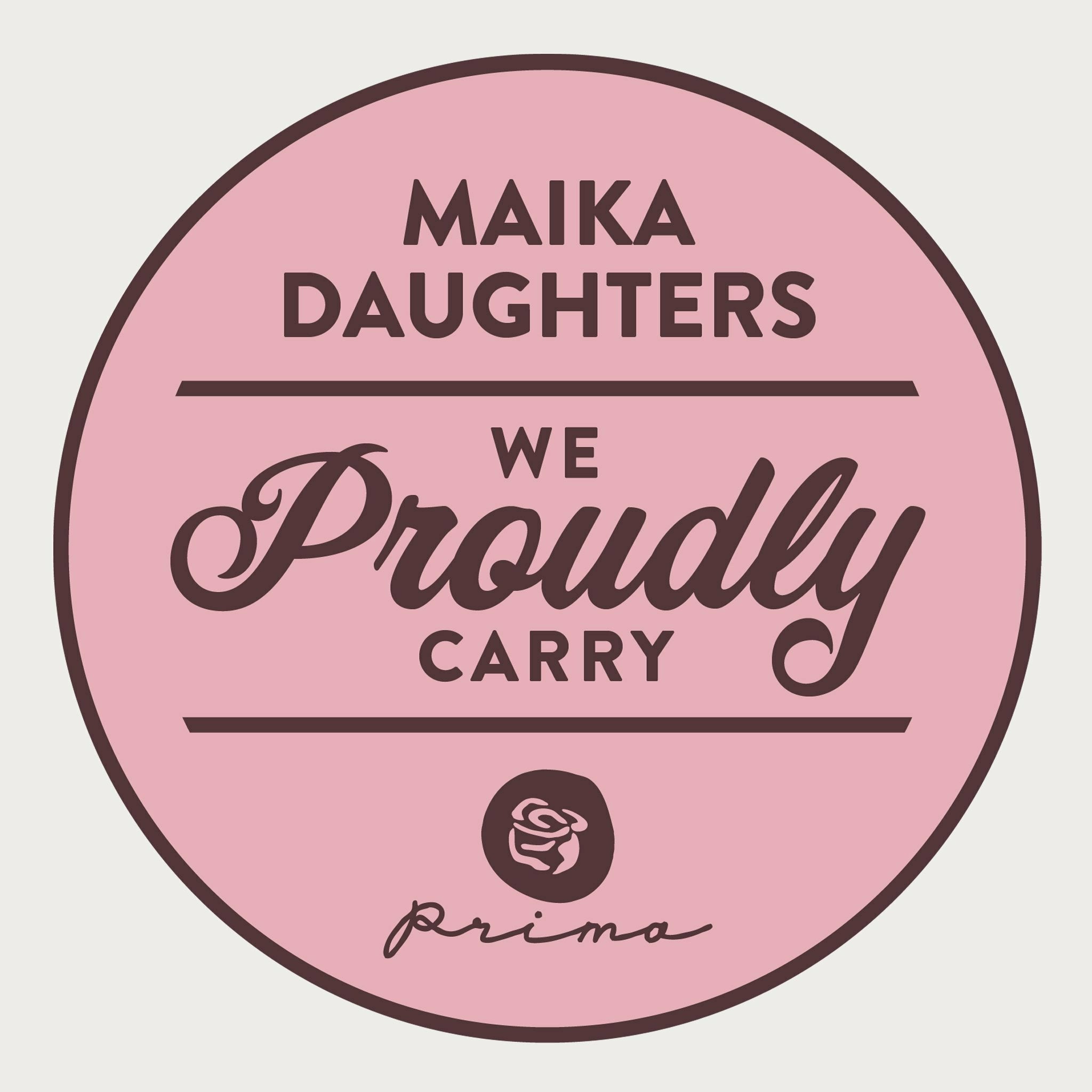 A white background with a pink circle, brown outline, and brown text that reads: Maika Daughters. We proudly carry Prima (using the Prima rose logo).