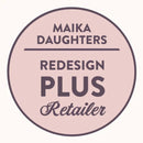 A white background with a pink circle with a brown outline and brown text reading: Maika Daughters. ReDesign Plus Retailer.