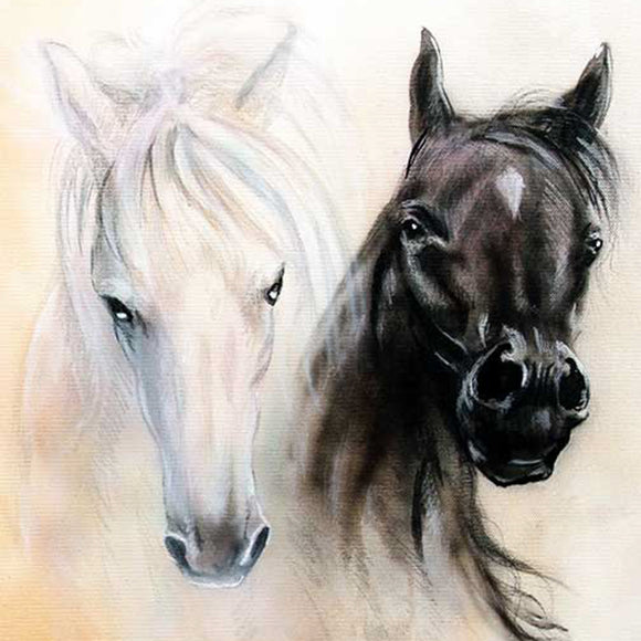 Close-up of a rice paper featuring portraits of a white horse and a black horse with a wood sign under them that says "Wild Horses".