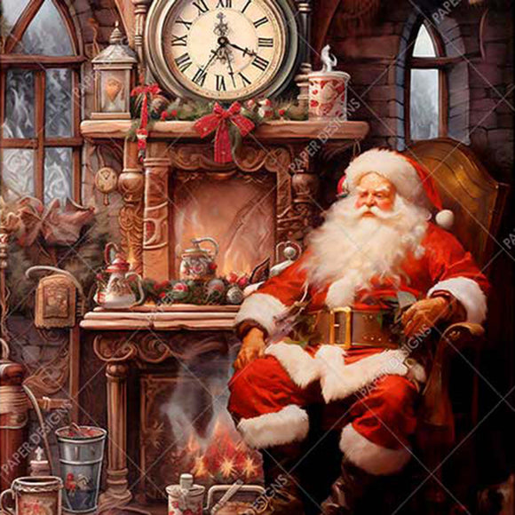 Close-up of a rice paper design that features Santa hunkering down in a cozy chair in front of a crackling fireplace.