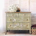 A vintage 4-drawer dresser is painted light yellow-green and features ReDesign with Prima's Alaina Toile transfer on it.