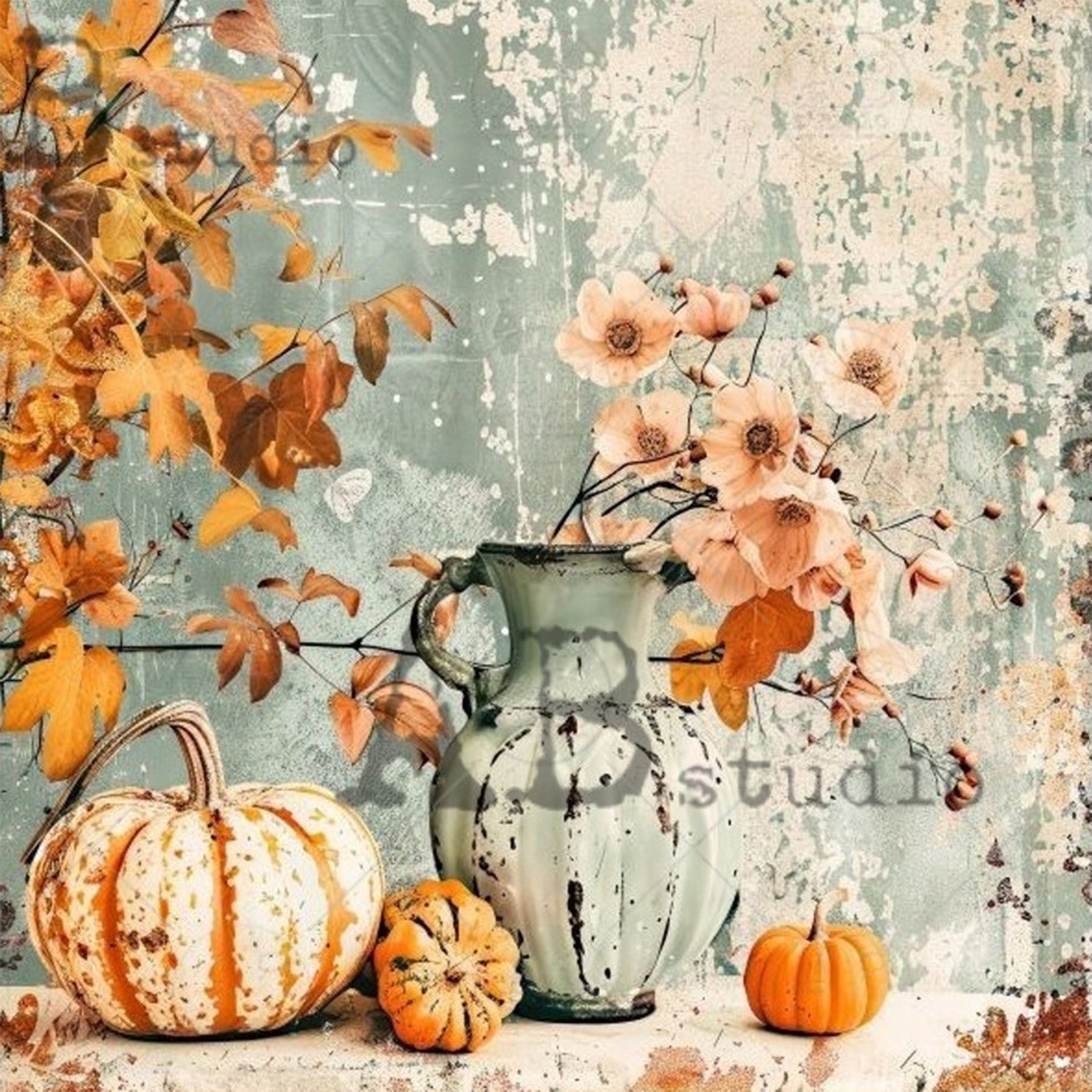 Close-up of a rice paper design featuring pumpkins, Autumn leaves, and pastel orange flowers in a milk vase against a distressed pale blue background.