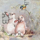 Close-up of an A4 rice paper featuring 2 adorable bunnies looking up at a small bird on a branch.