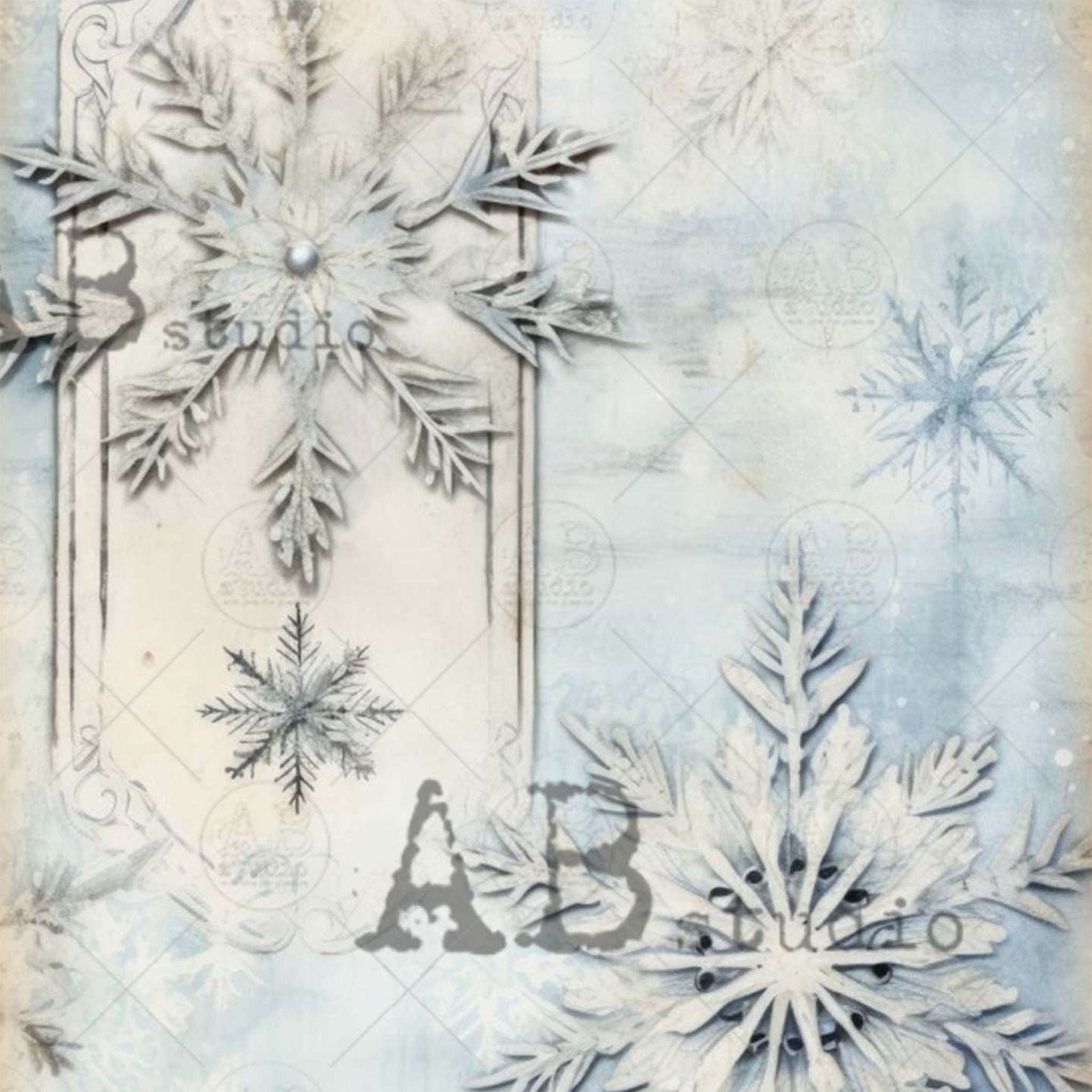 Close-up of an A4 rice paper design featuring two majestic snowflakes against a frosty blue background.