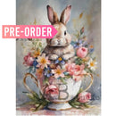 A4 rice paper design featuring a sweet bunny in a teacup surrounded by a bouquet of flowers. White borders on the sides.