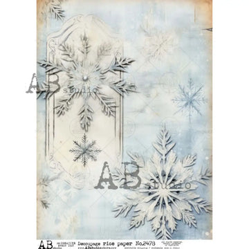 An A4 rice paper design featuring two majestic snowflakes against a frosty blue background is against a white background.