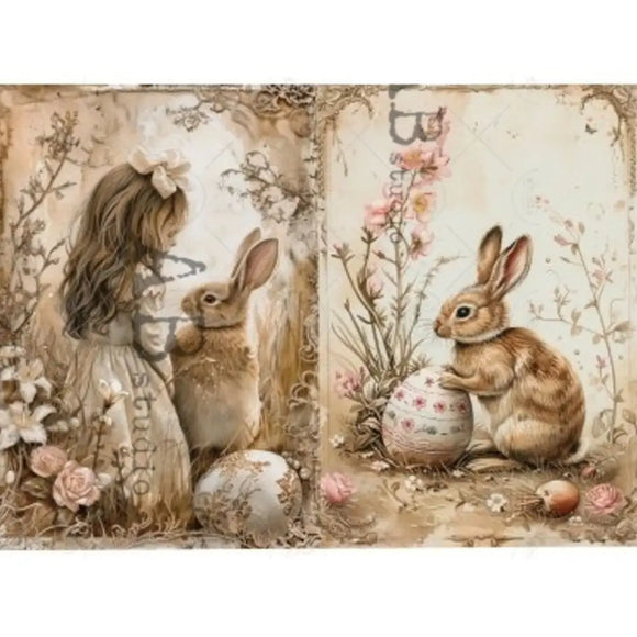 Rice paper featuring 2 designs of bunnies and eggs surrounded by flowers, one with a little girl. White borders are on the top and bottom.