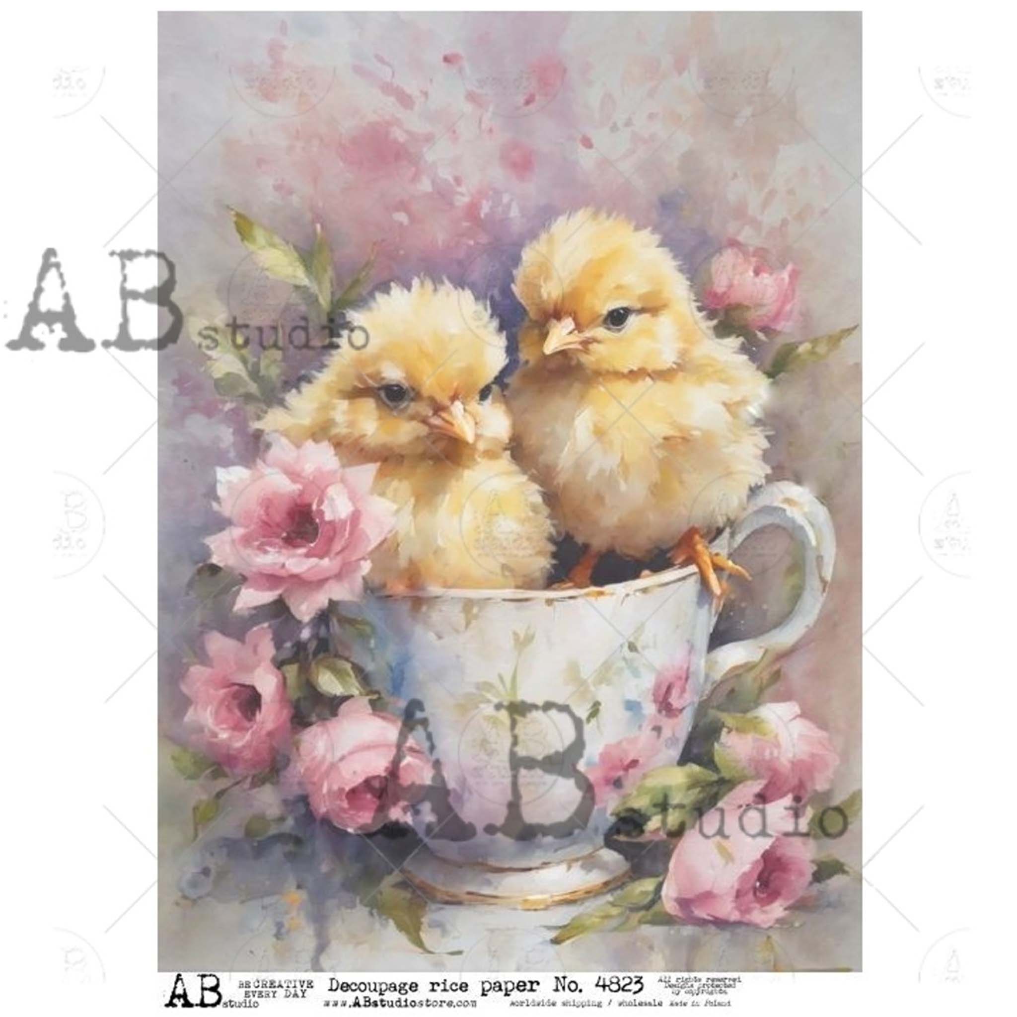 A4 rice paper design that features 2 cute yellow chicks nestled in a teacup, surrounded by sweet pink flowers and are against a white background.