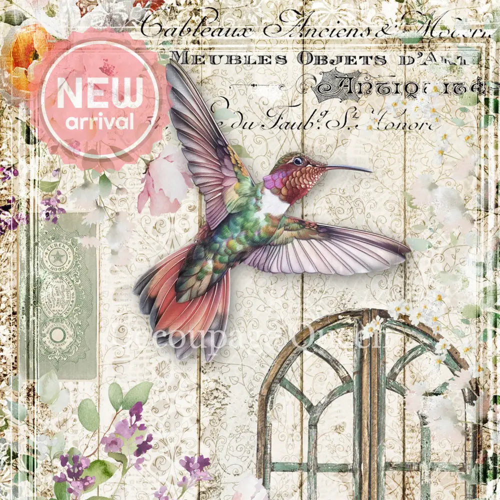 Close-up of a rice paper that features a beautiful hummingbird design over a vintage document and surrounded by flowers. 