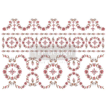 Rub-on transfer that features a dainty, winding floral pattern in stunning shades of blush and brown.