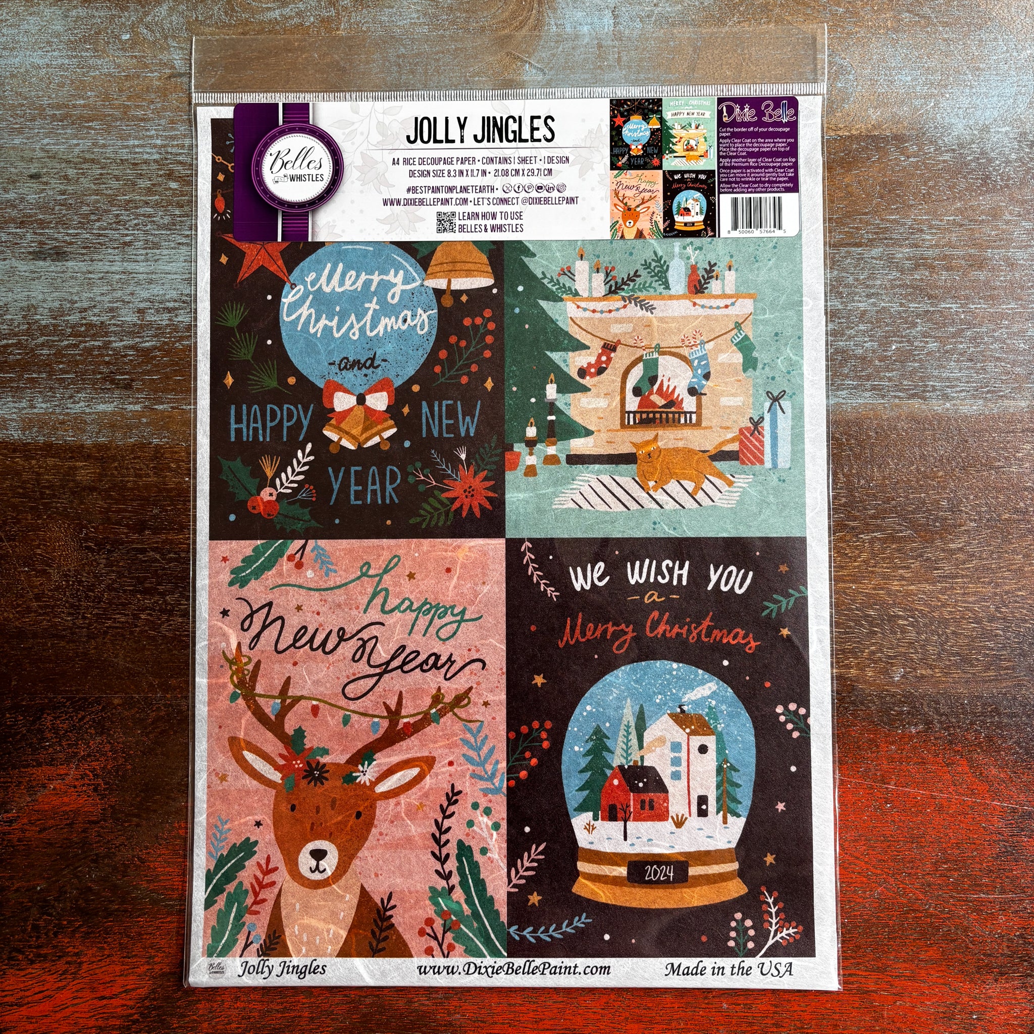 A package of Belles & Whistles' Jolly Jingles A4 rice paper is against a dark wood background.