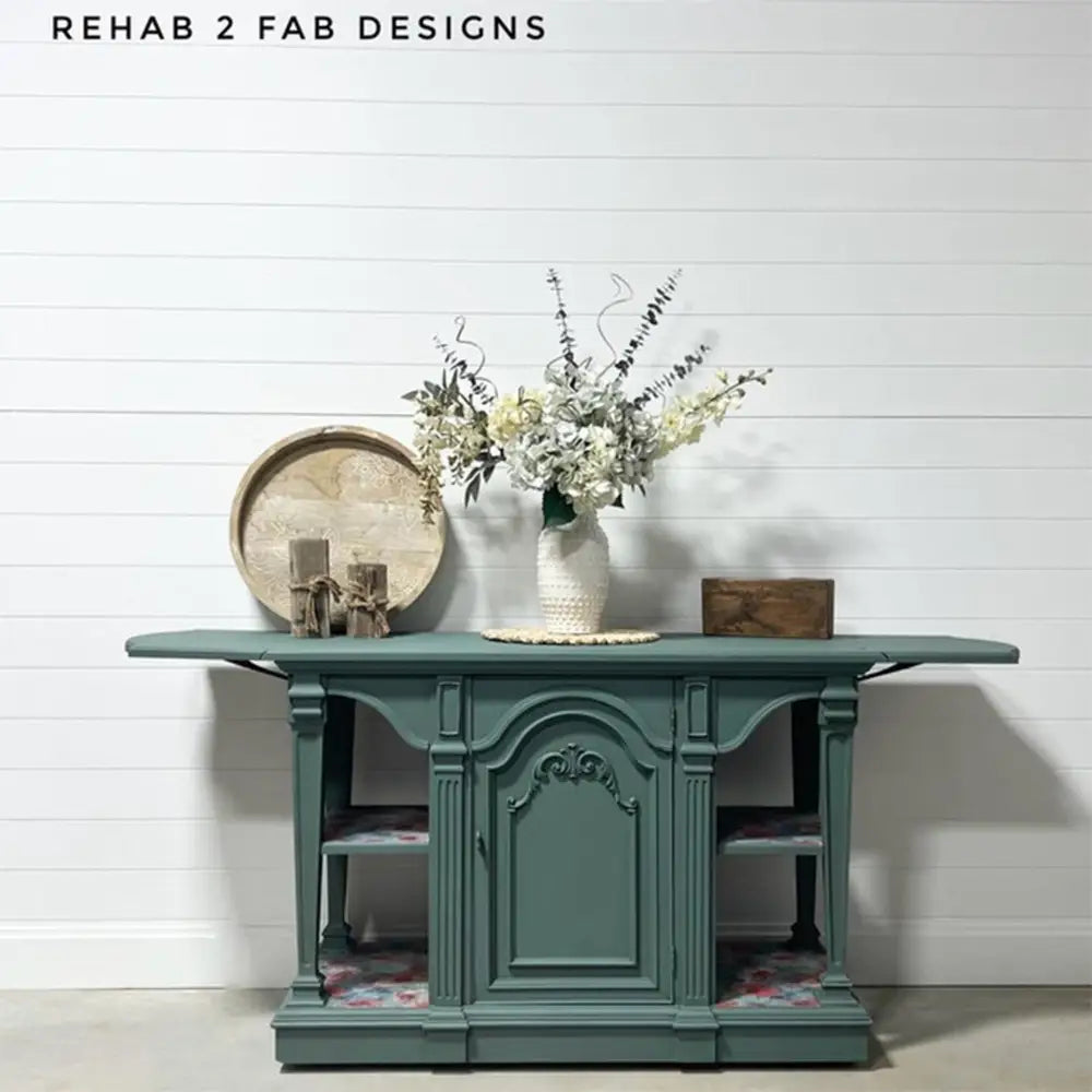 A vintage console table refurbished by Rehab 2 Fab Designs is painted in Dixie Belle's Blue Grass Chalk Mineral Paint.