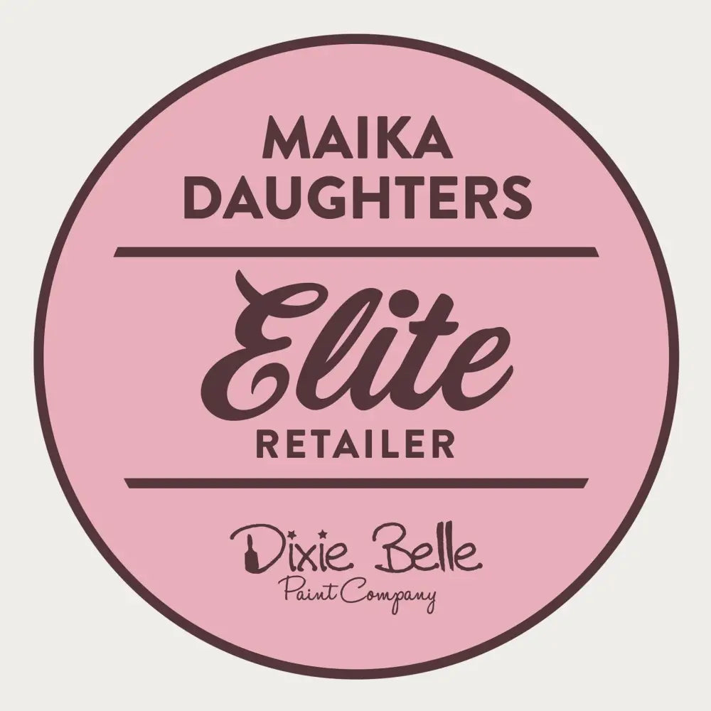 A white background with a pink circle with a brown outline and brown text reading: Maika Daughters. Elite Retailer. Dixie Belle Paint Company.