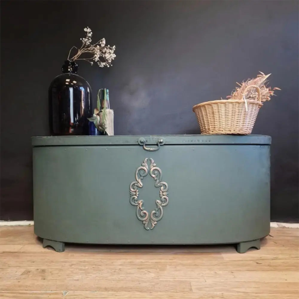 A vintage chest features Dixie Belle's Briar Patch Chalk Mineral Paint on it.