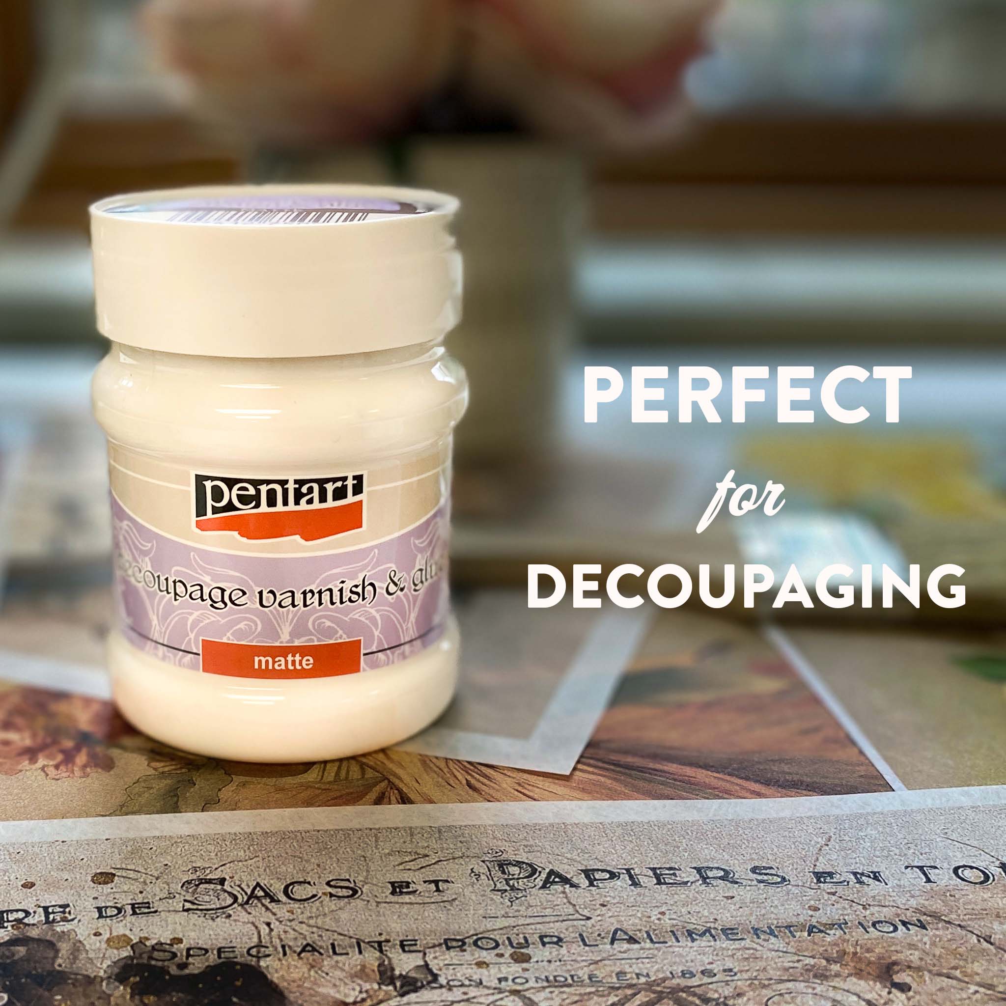 A container of Pentart Matte Decoupage Varnish & Glue sits on decoupage papers on a table. To the right is white text that reads: Perfect for decoupaging.