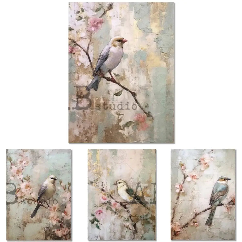 Rice paper designs against a white background that feature 4 images of birds perched on delicate cherry blossom branches against pale blue backdrops.