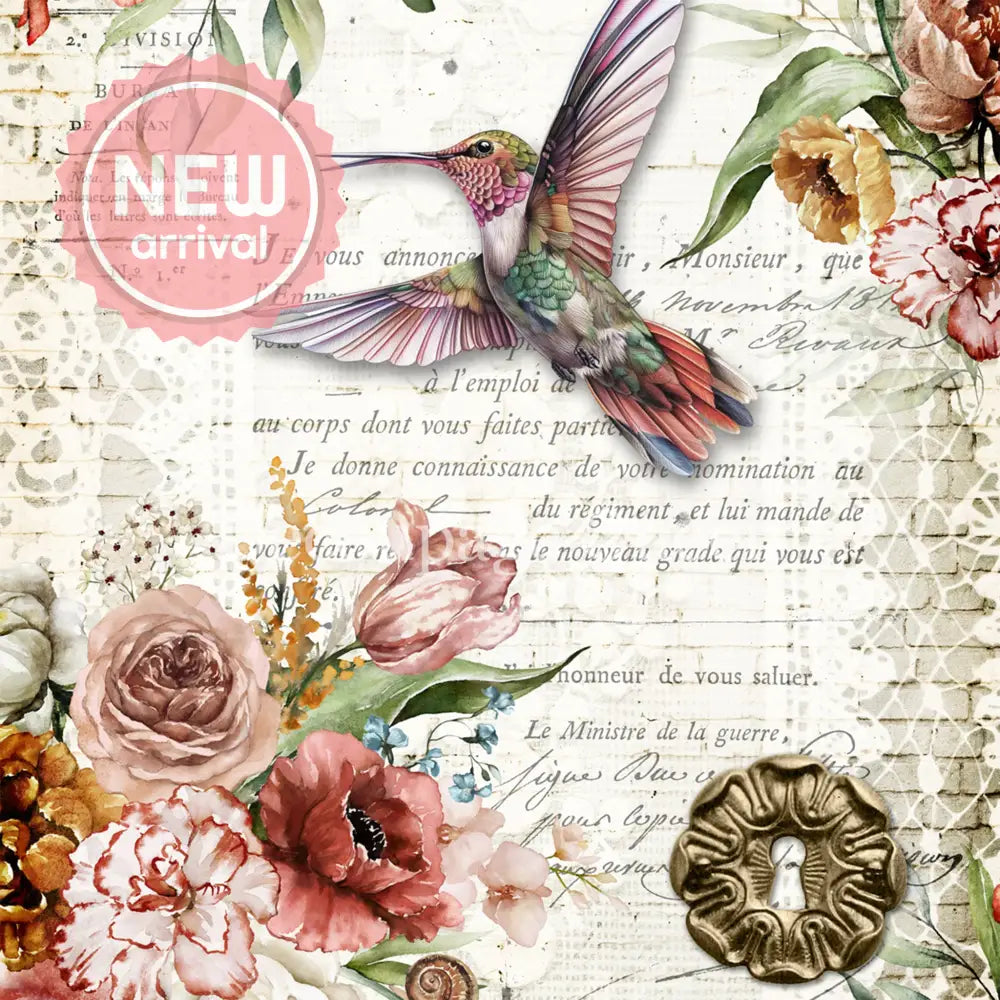 Close-up of a rice paper design featuring a vibrant hummingbird, vintage floral document, and charming key and keyhole.