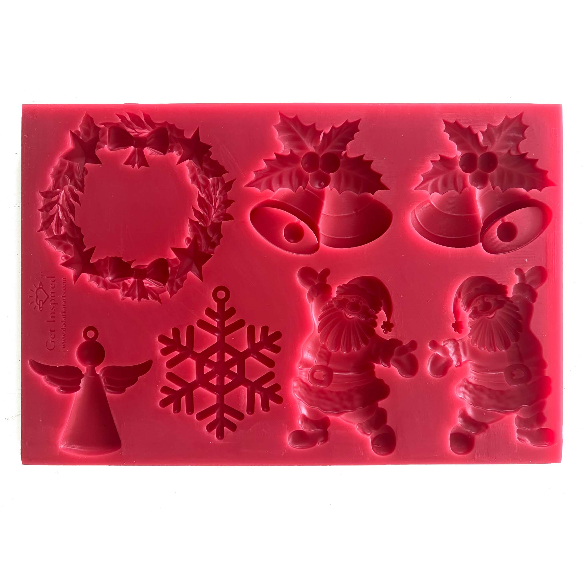 A red silicone mould of Get Inspired by Dadarkar Art's Christmas Charm is against a white background.