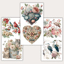 Three sheets of small rub-on transfers featuring exotic birds, floral hearts, and even kittens in a metal bucket surrounded by flowers in dreamy pinks, blues, and reds are against a light beige background.