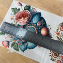 Floral design with a ruler on a wooden surface