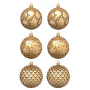 Six gold colored ornate half ornaments created from a silicone mold are against a white background.