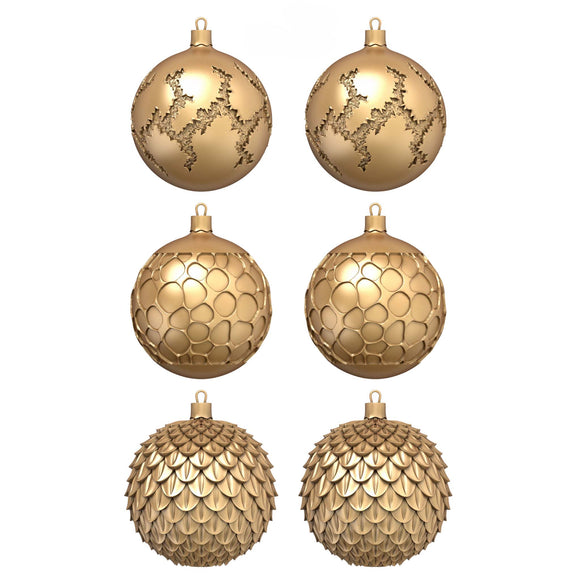Six gold colored ornate half ornaments created from a silicone mold are against a white background.