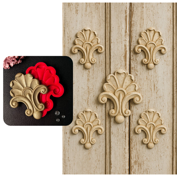 Decorative wall appliqués on a wooden panel with close-up inset showing the silicone mold.