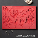 Dadarkar Arts Magnolia Grace silicone mold with magnolia flower and leaf castings displayed on top