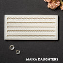 A light beige silicone mold featuring 5 mini rope borders is against a dark grey background.