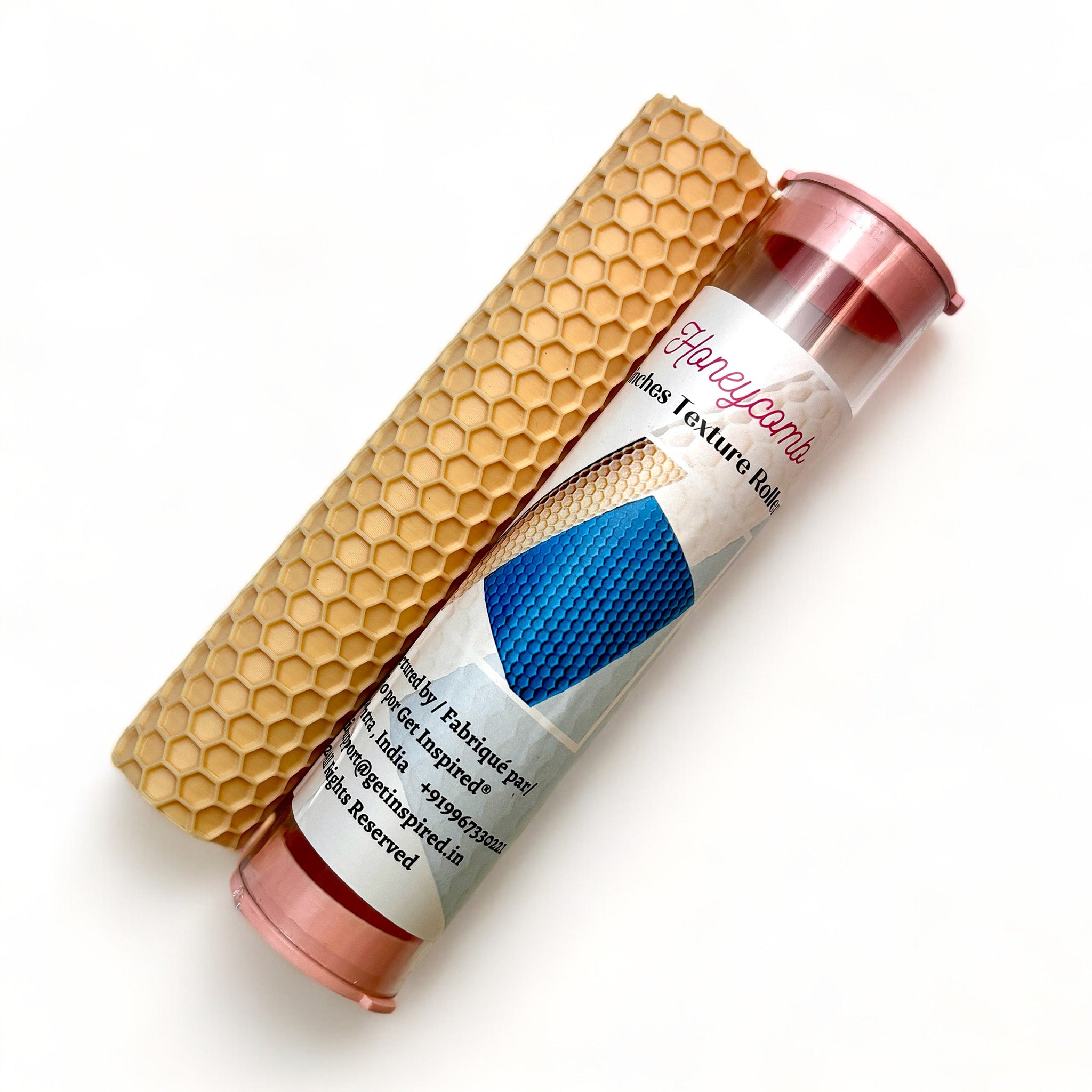 A texture roller and packaging tube of Dadarkar Art's Honeycomb are against a white background.
