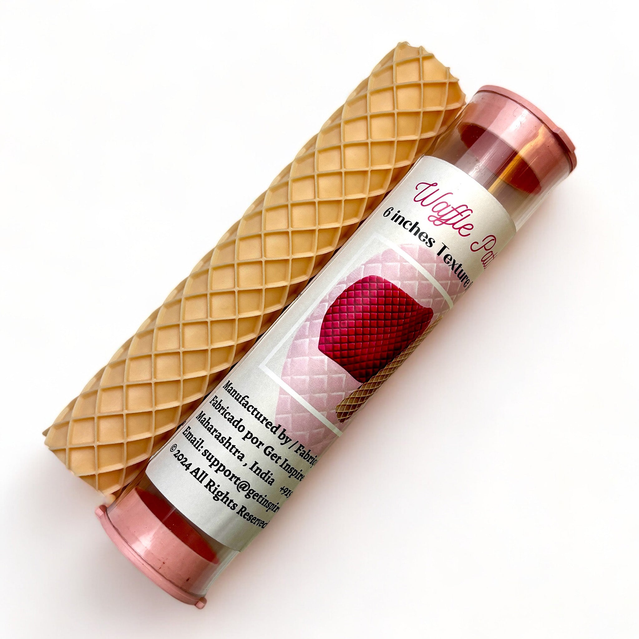 A texture roller and packaging tube of Dadarkar Art's Waffle Pattern are against a white background.
