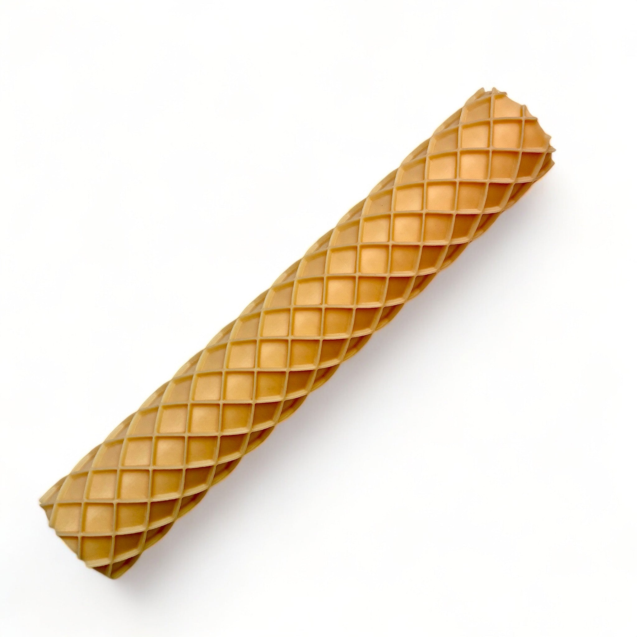 A seamless texture roller featuring a waffle pattern is against a white background.
