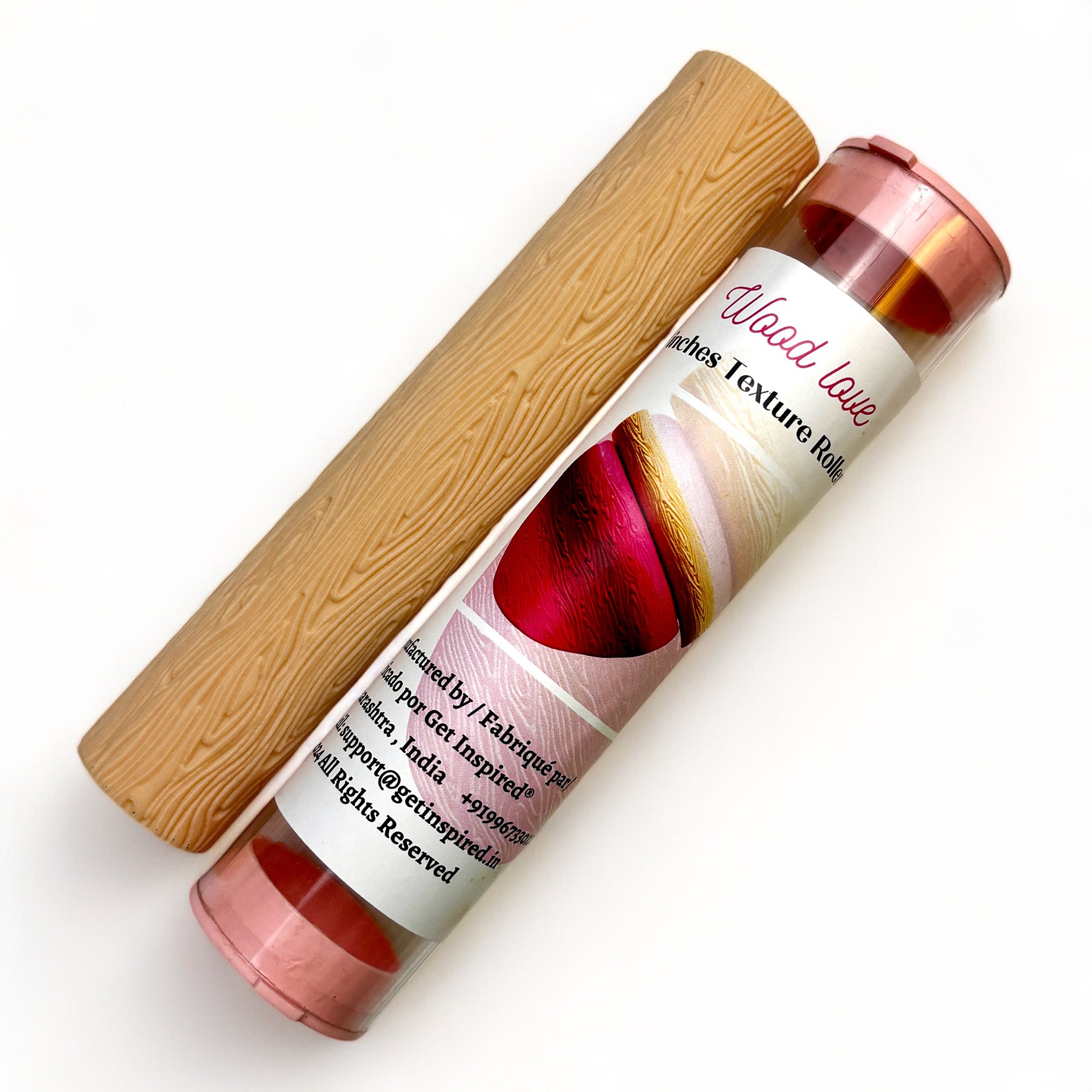 A texture roller and packaging tube of Dadarkar Art's Wood Love are against a white background.
