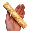 A hand is shown holding Dadakar Art's Zig Zag Pattern Texture Roller against a white background.
