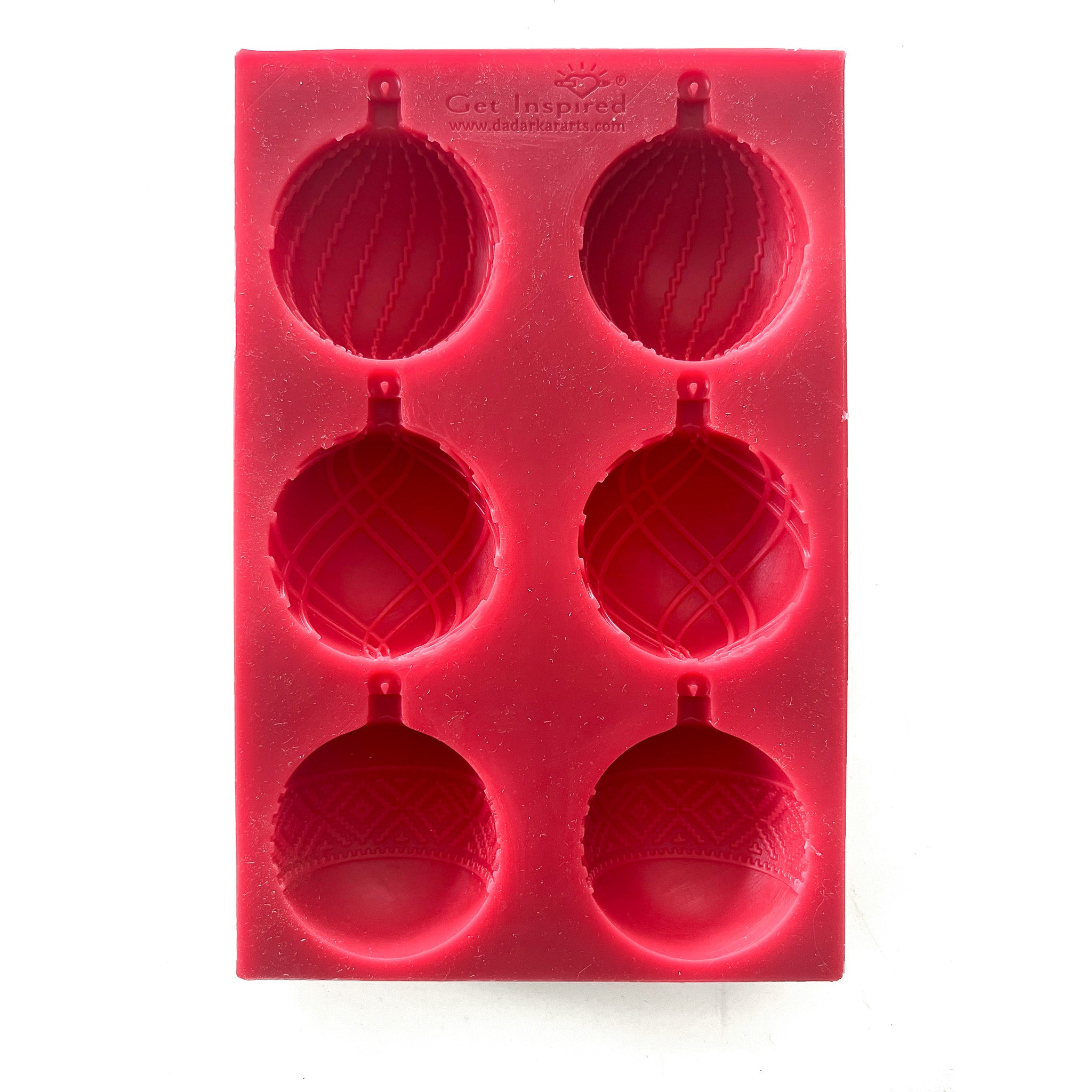 A red silicone mould of Get Inspired by Dadarkar Art's Christmas Ornaments is against a white background.