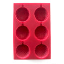 A red silicone mold that features 6 ornate half ornaments that make 3 full ornaments is against a white background.