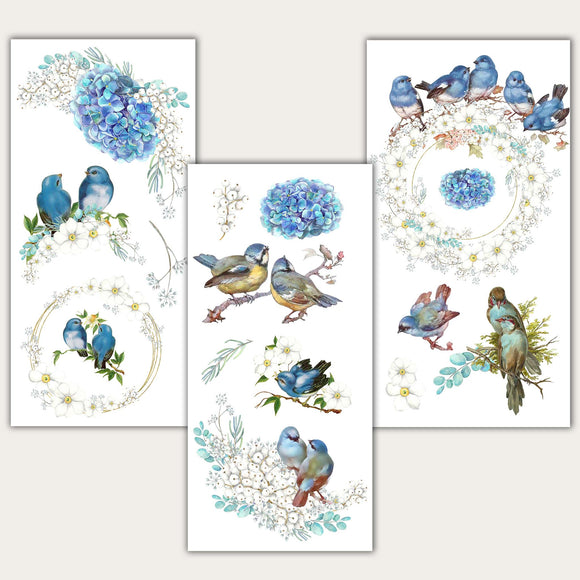 Three sheets of small rub on transfers featuring beautiful hydrangea blooms in blues and purples, complete with whimsical blue birds are against a beige background.