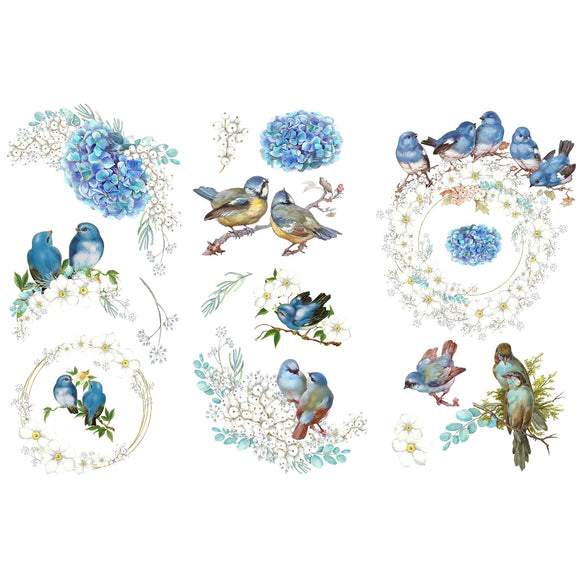 Small rub on transfers that feature beautiful hydrangea blooms in blues and purples, complete with whimsical blue birds are against a white background.