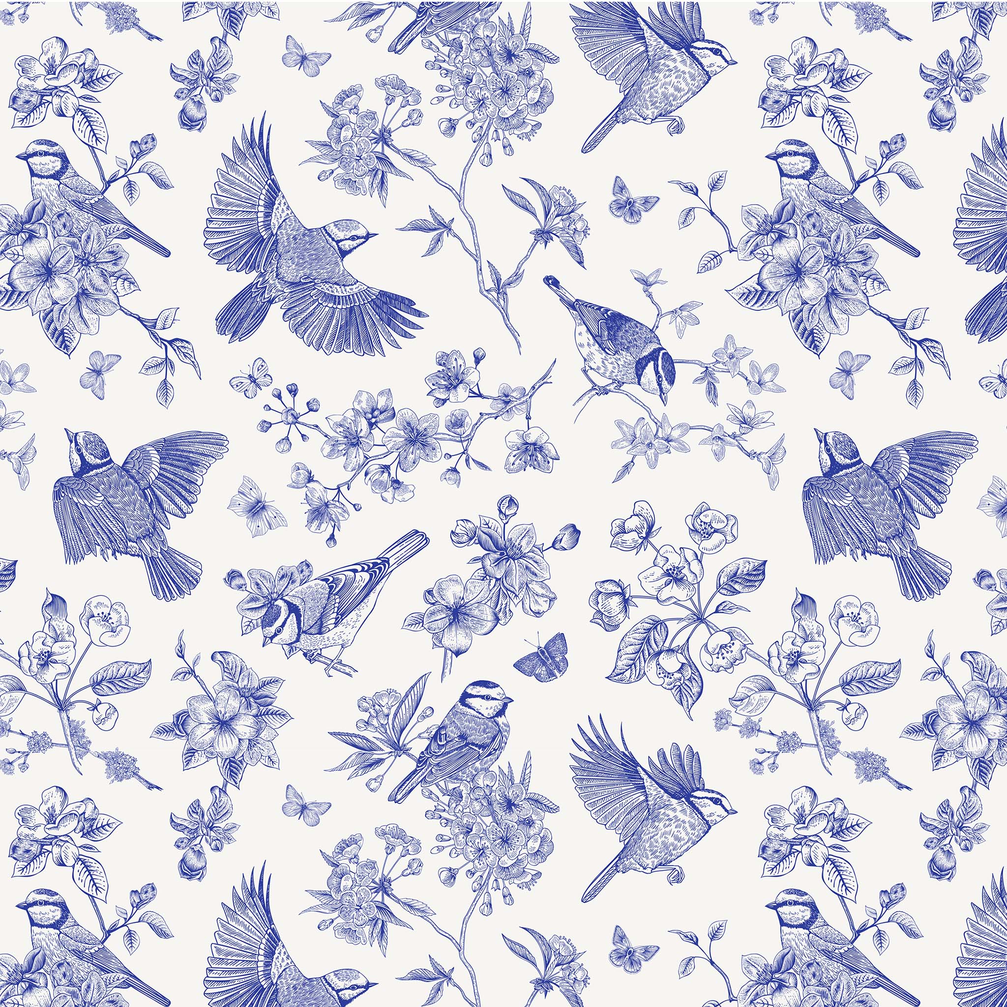 Close-up of a tissue paper design that features a playful blue and white Delft style print, depicting birds in flight and resting on branches with floral accents.