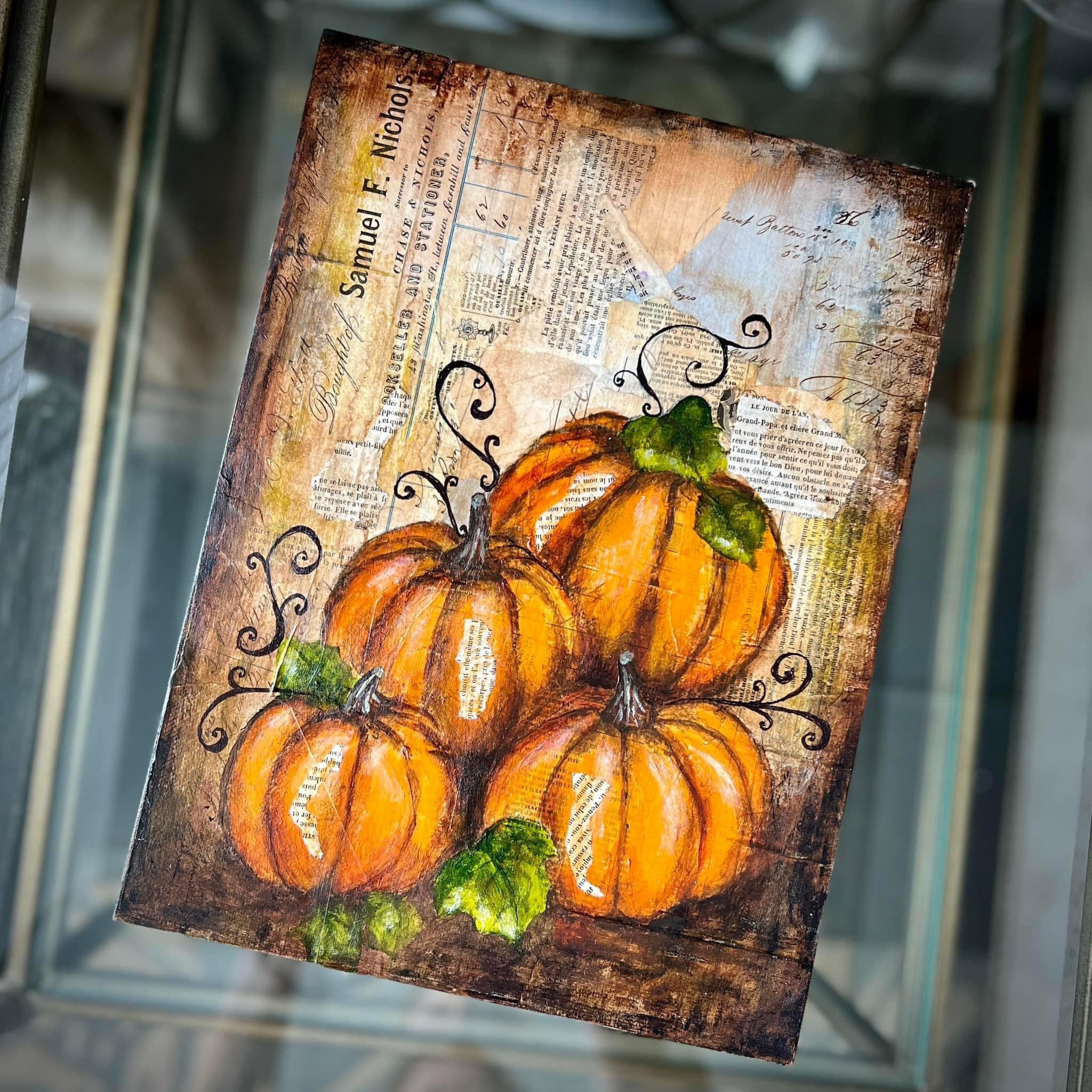 A wood craft features Decoupage Queen's Painted Pumpkins A4 rice paper on it.