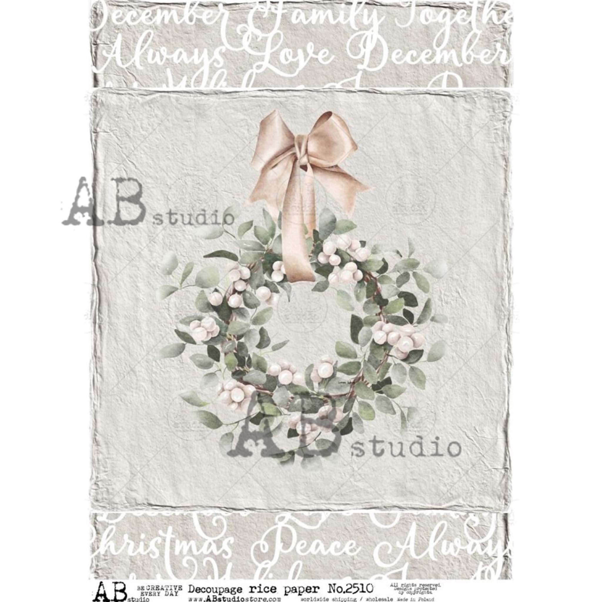 A4 rice paper design that features a country wreath against a distressed gray backdrop with Christmas words bordering the top and bottom is against a white background.