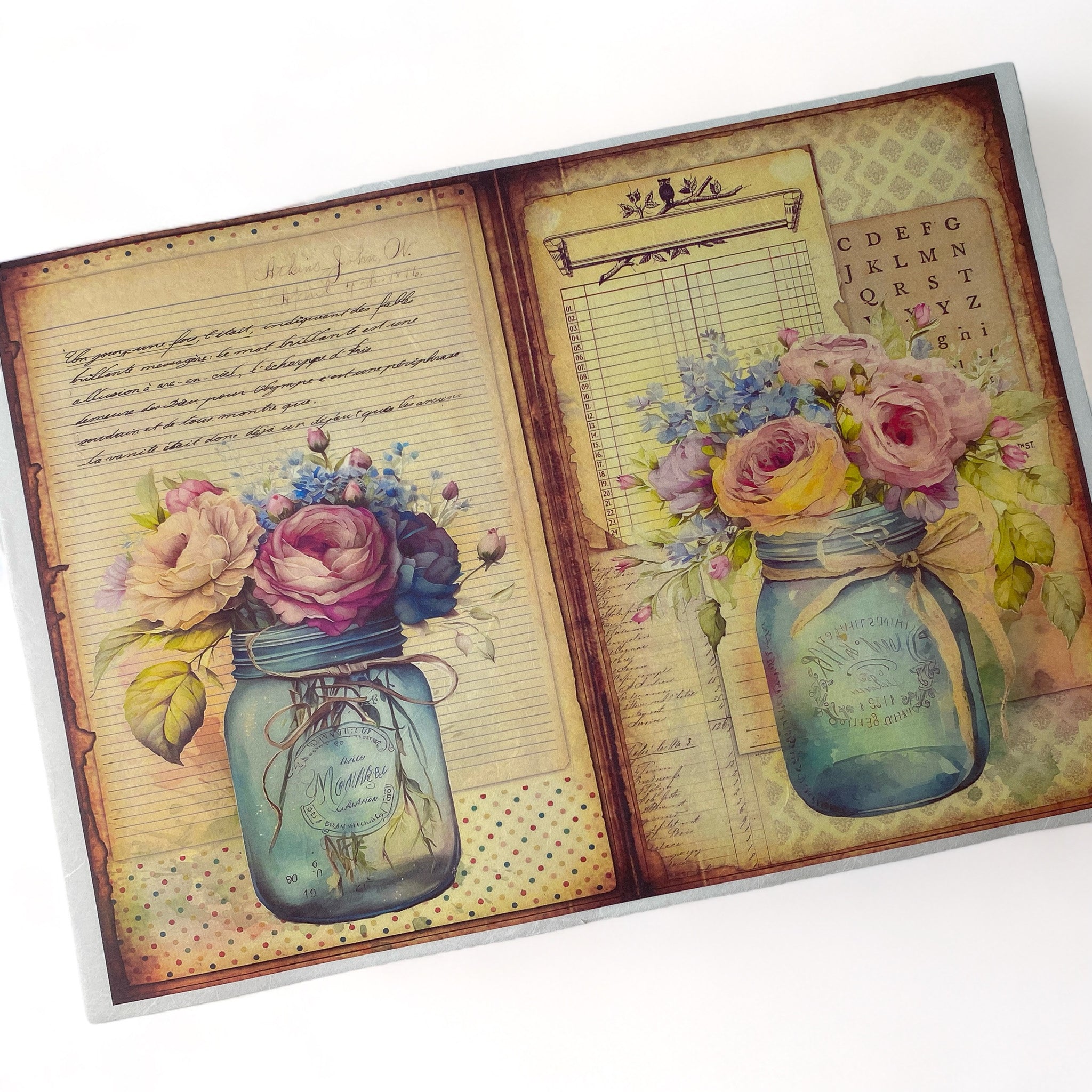 A4 rice paper design that features two charming images of pink flowers in blue mason jars on vintage documents is against a white background.