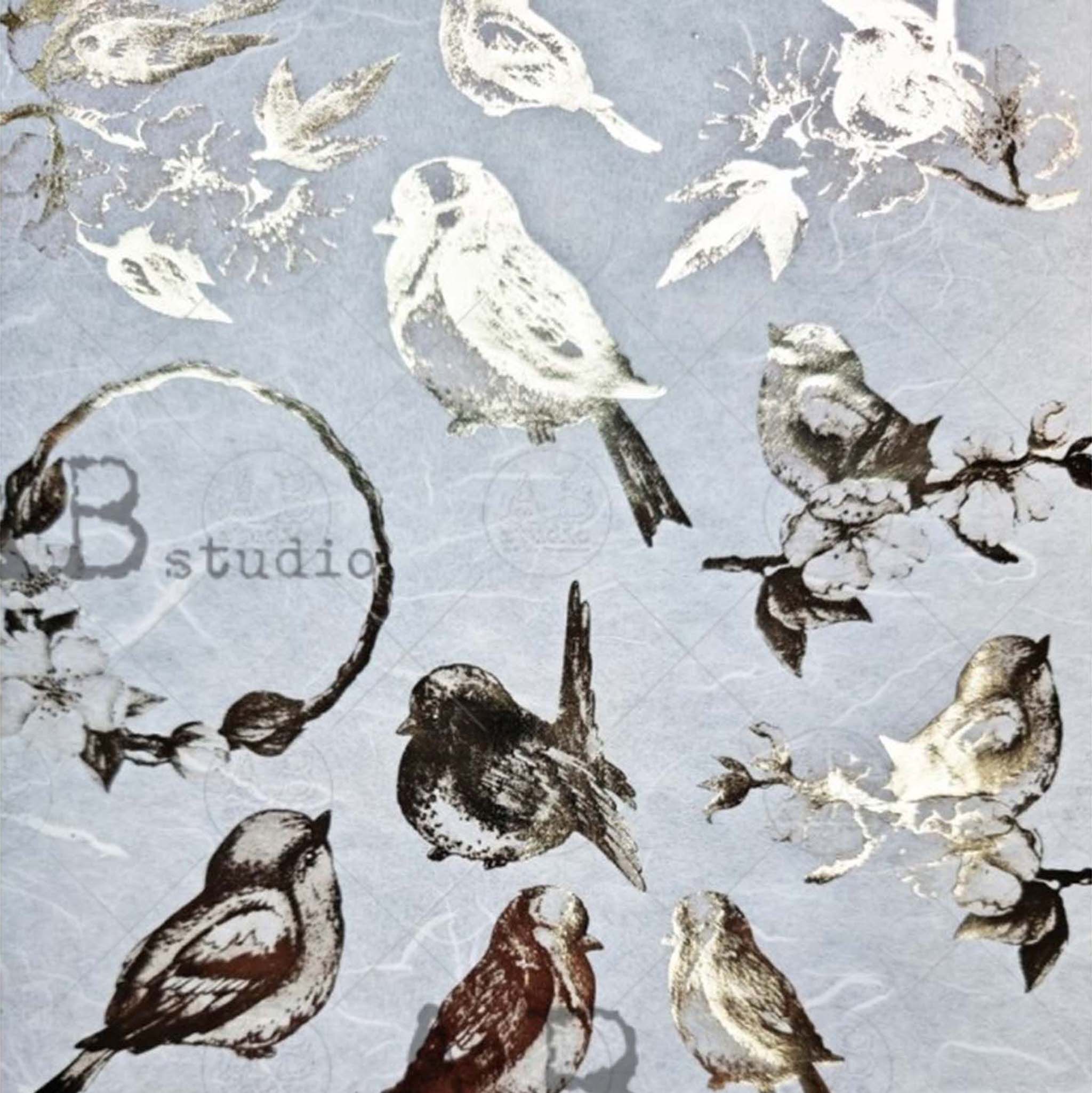 Close-up of an A4 rice paper design that features metallic gilded birds on a subtly distressed background.