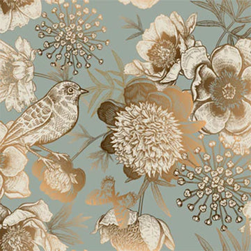 Close-up of a decoupage paper featuring beautiful white birds and delicate flowers, outlined in gold foil on a light blue background.