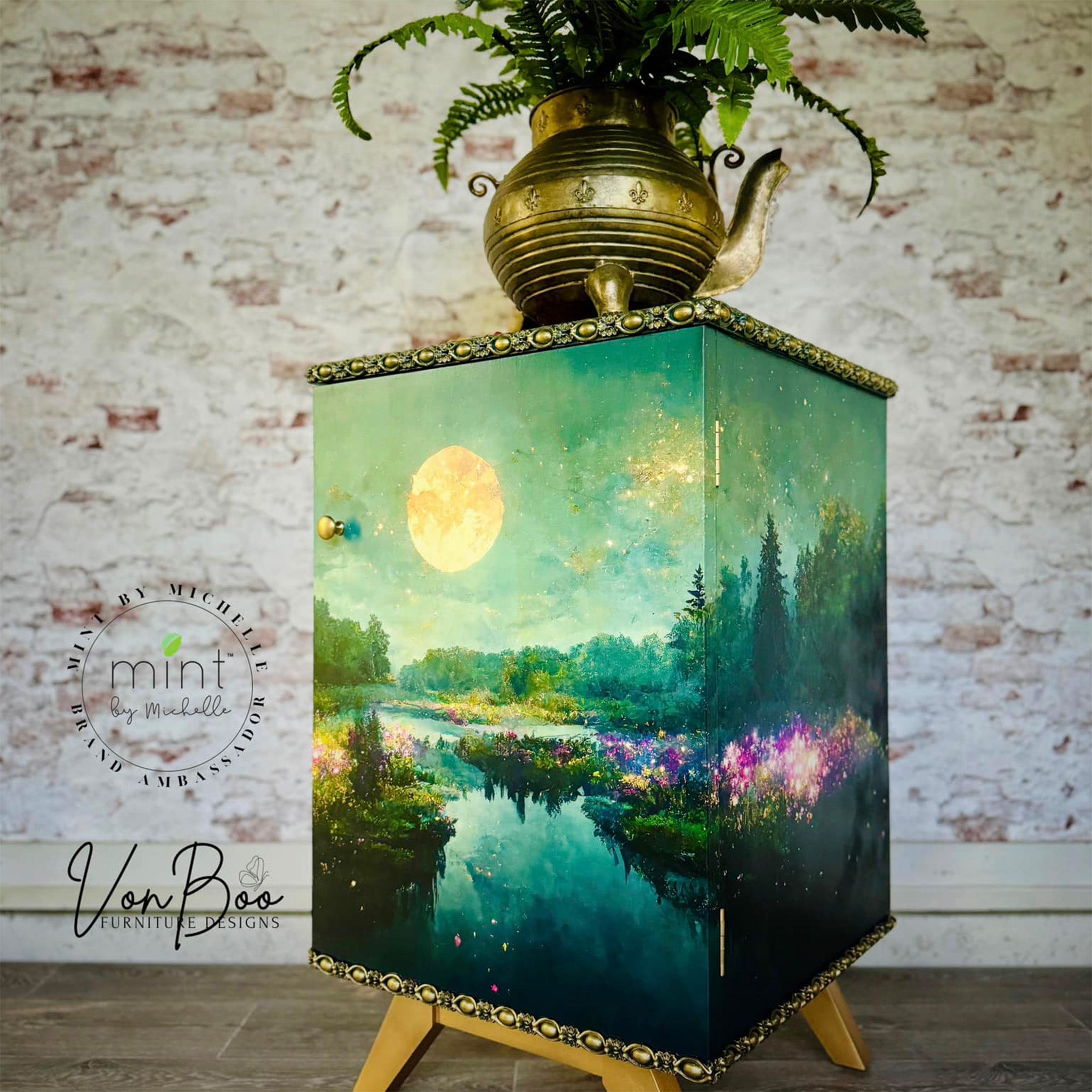 A vintage nightstand refurbished by Von Boo features Mint by Michelle's Moon River decoupage paper wrapped around it.